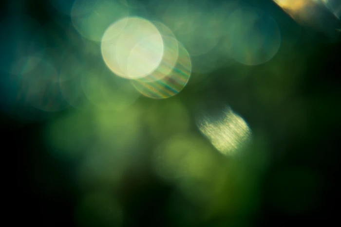 white light bokeh effect green texture round dark background 2k 4k 5k
