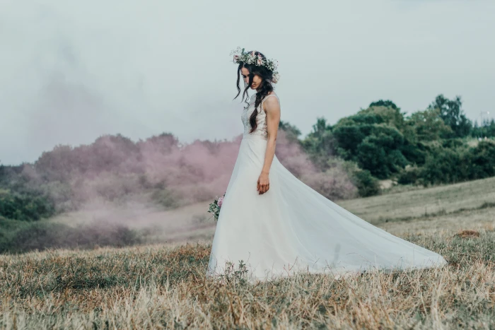 Bride mystical walking woman standing on grass field wearing wedding gown 2k 4k 5k