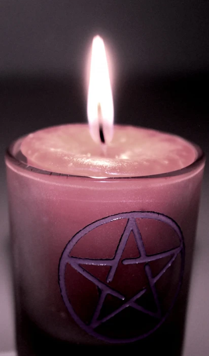 closeup photo of lighted pink votive candle magic magick 2k