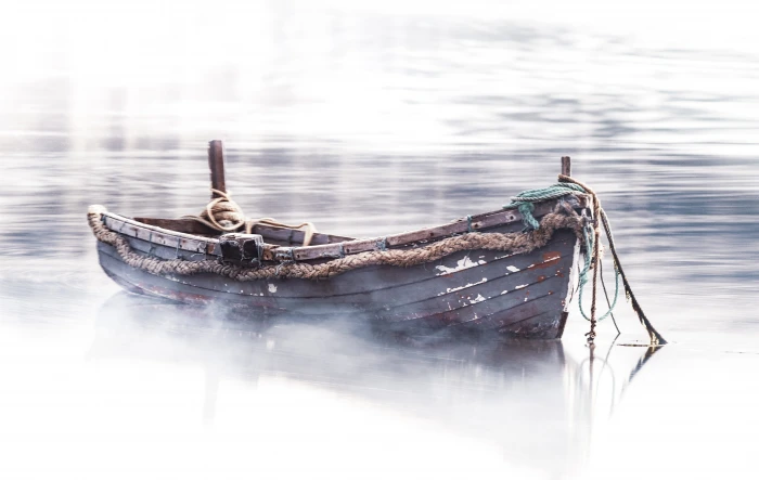 empty brown boat on body of water photo canoe 2k 4k 5k