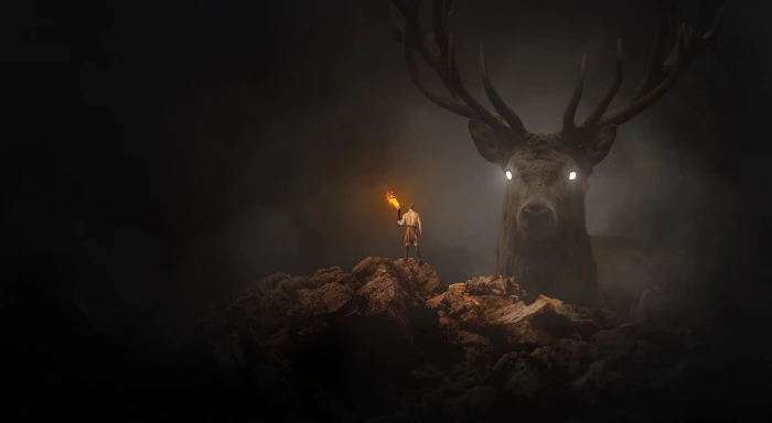 Fantasy man holding torch in front of deer wallpaper Aero Creative 2k
