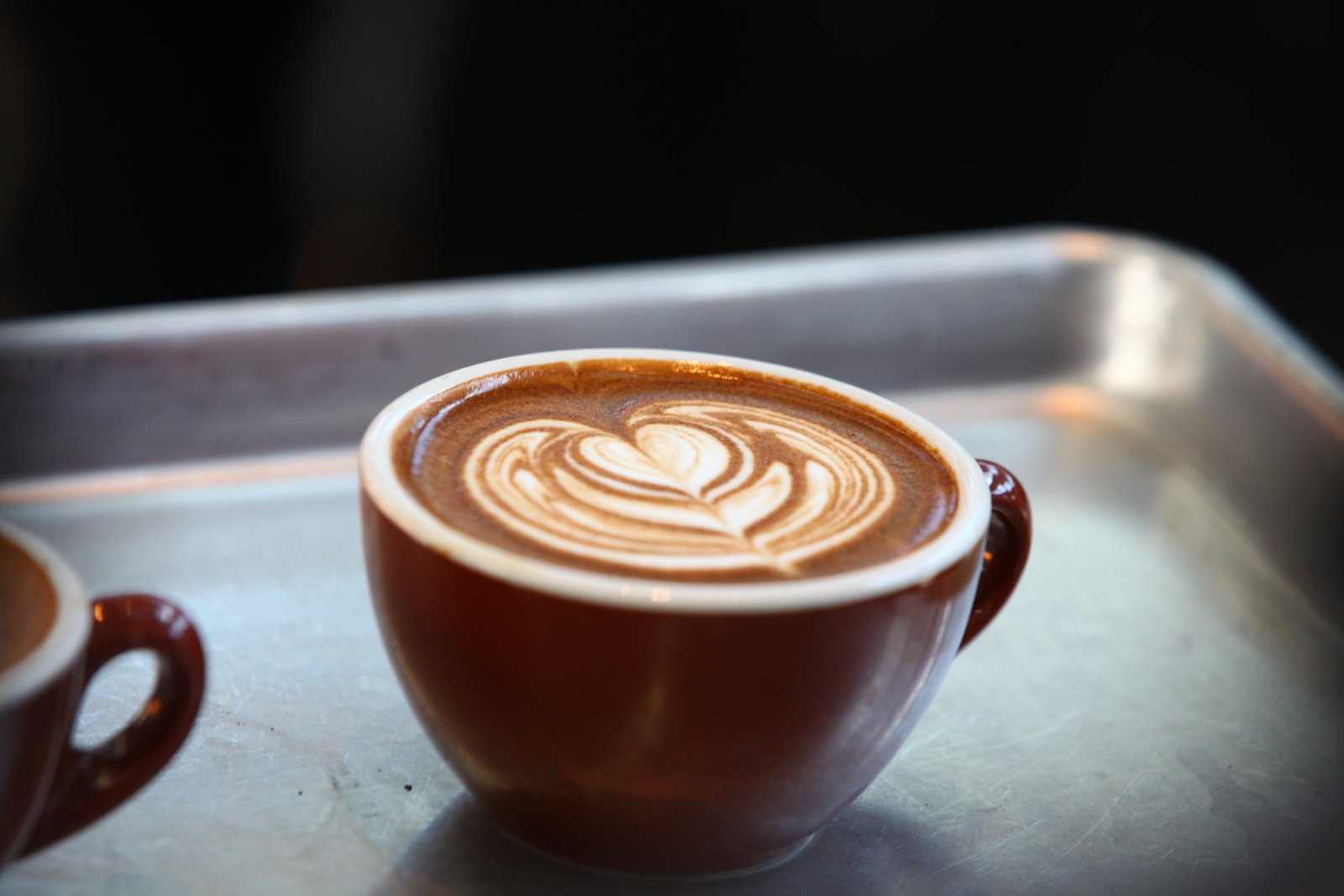 brown ceramic mug on stainless steel tray seattle Latte Art 2k 4k 5k