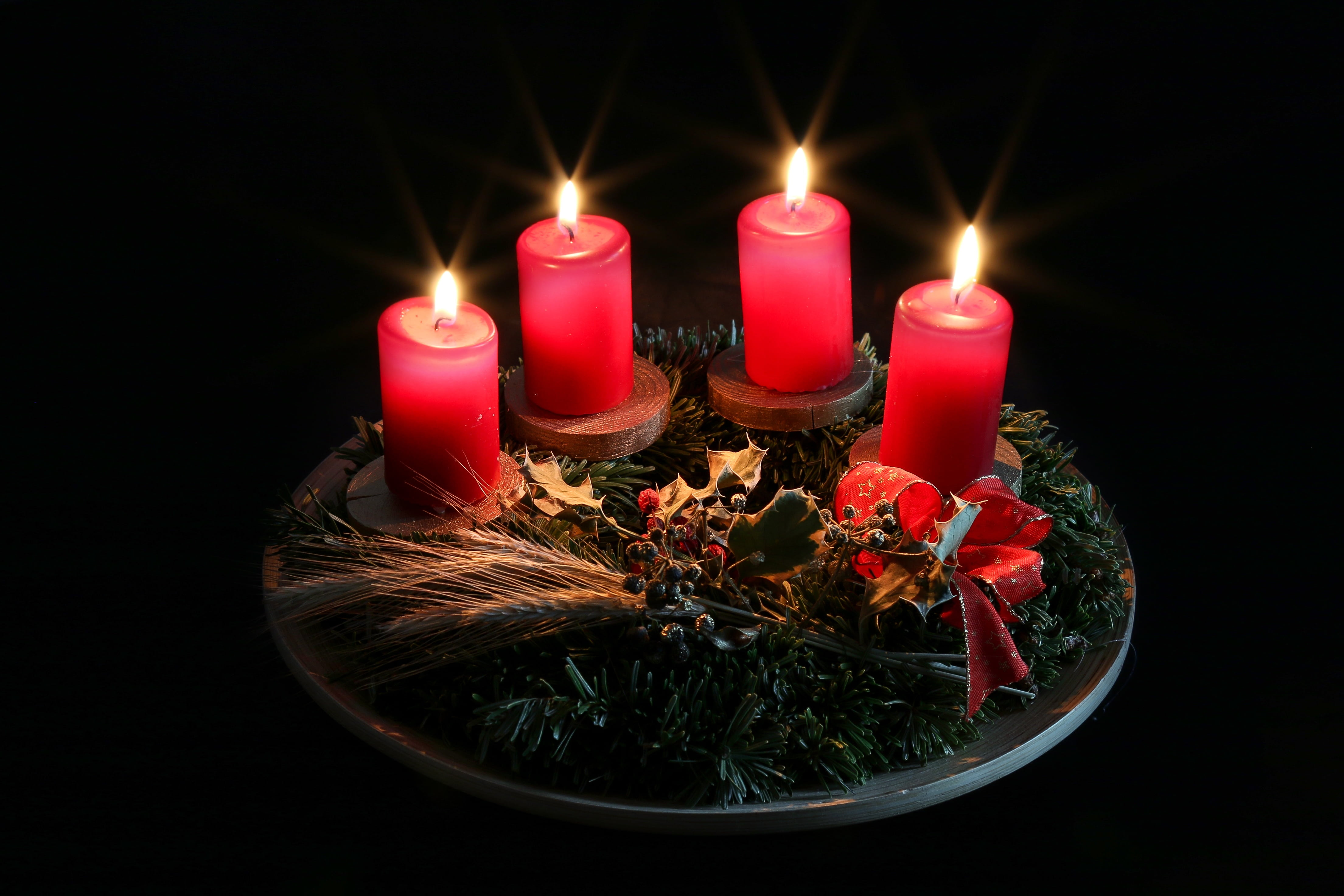 three lighted red pillar candles advent christmas wreath 2k 4k