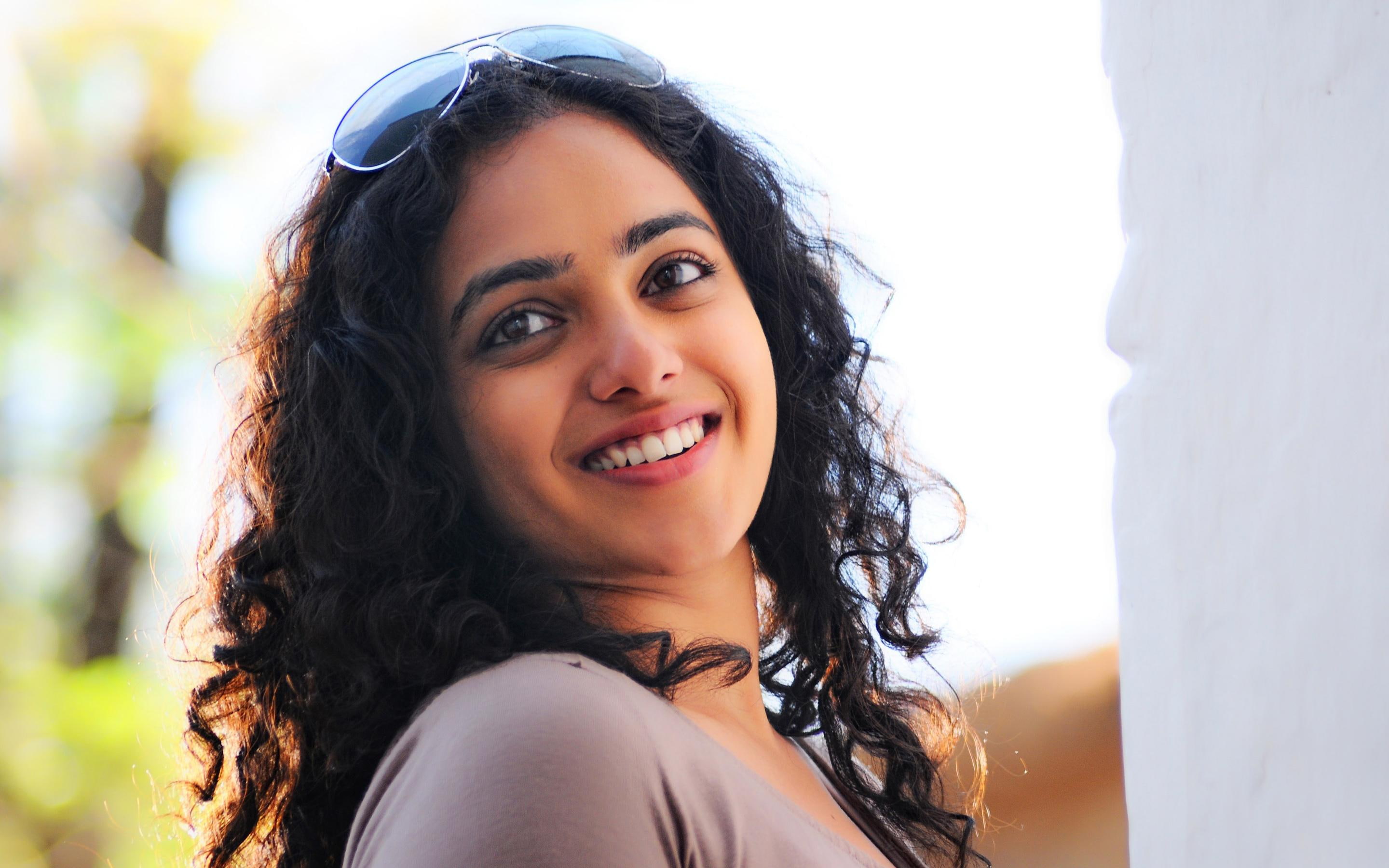 Actress Nithya Menon women's black framed sunglasses 2k
