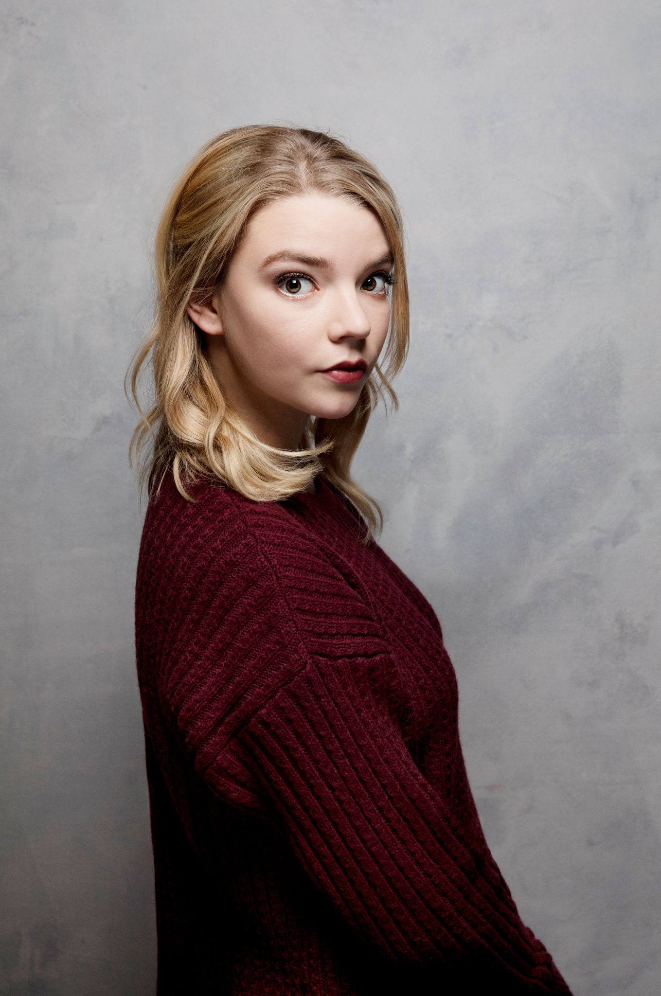 Anya Taylor Joy women actress blonde sweater simple background