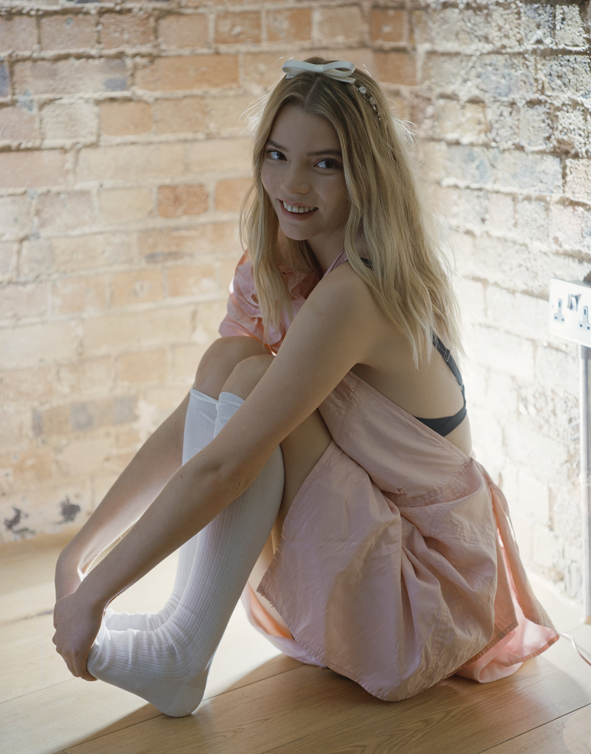 Anya Taylor Joy women actress blonde white socks wooden floor 2k