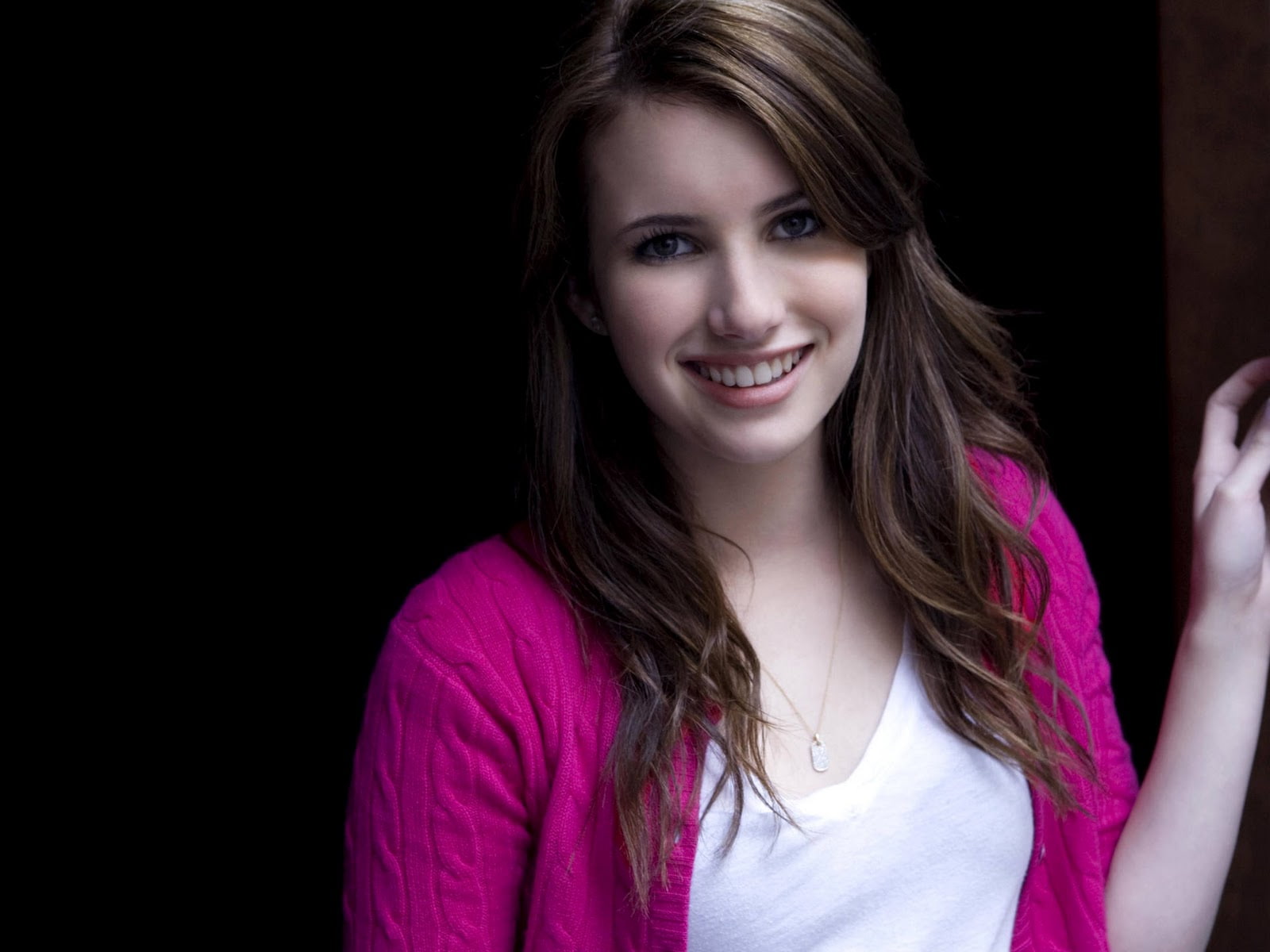 Emma Roberts actress smiling brunette blue eyes looking at viewer