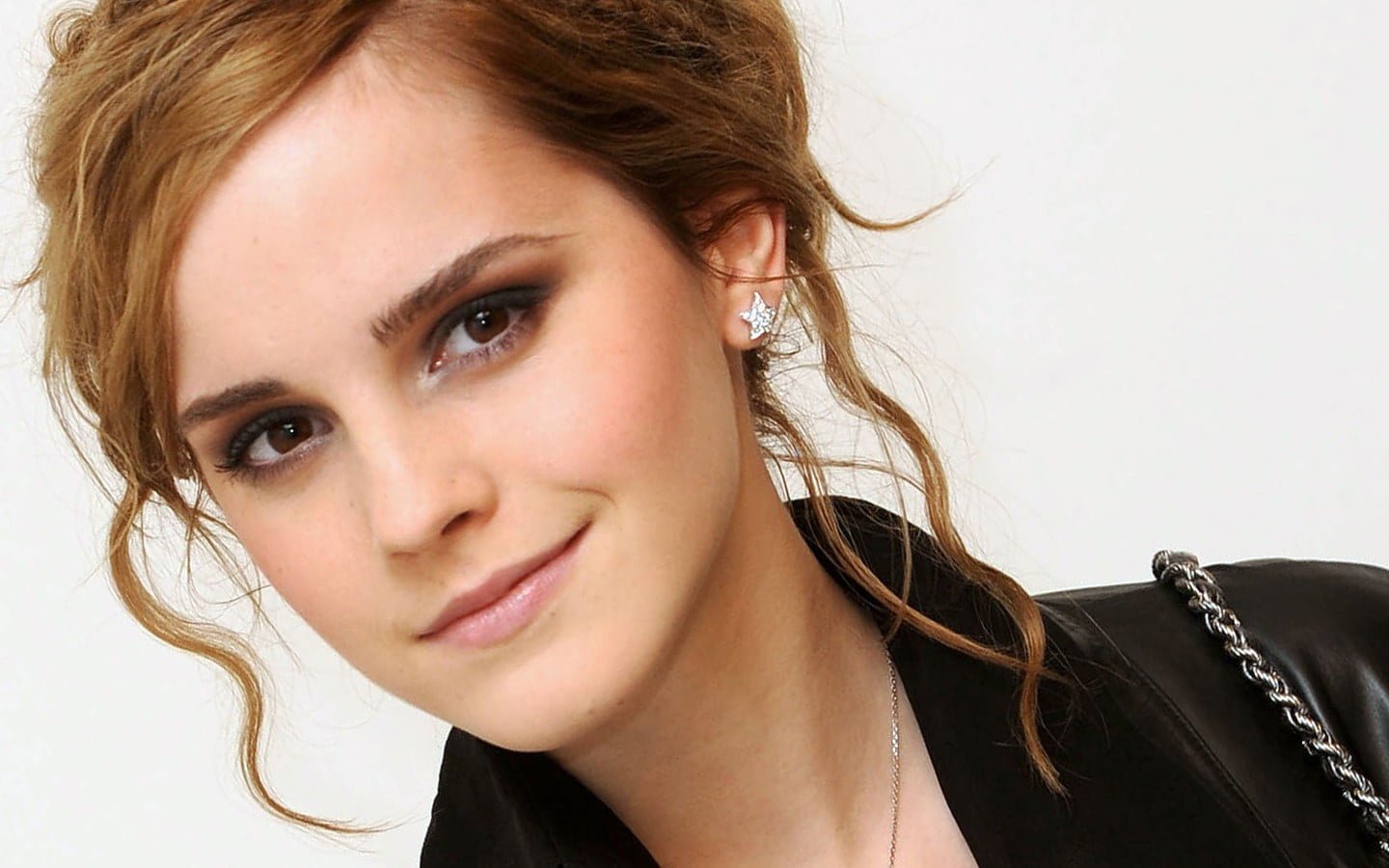 Emma Watson smiling actress celebrity brunette simple background