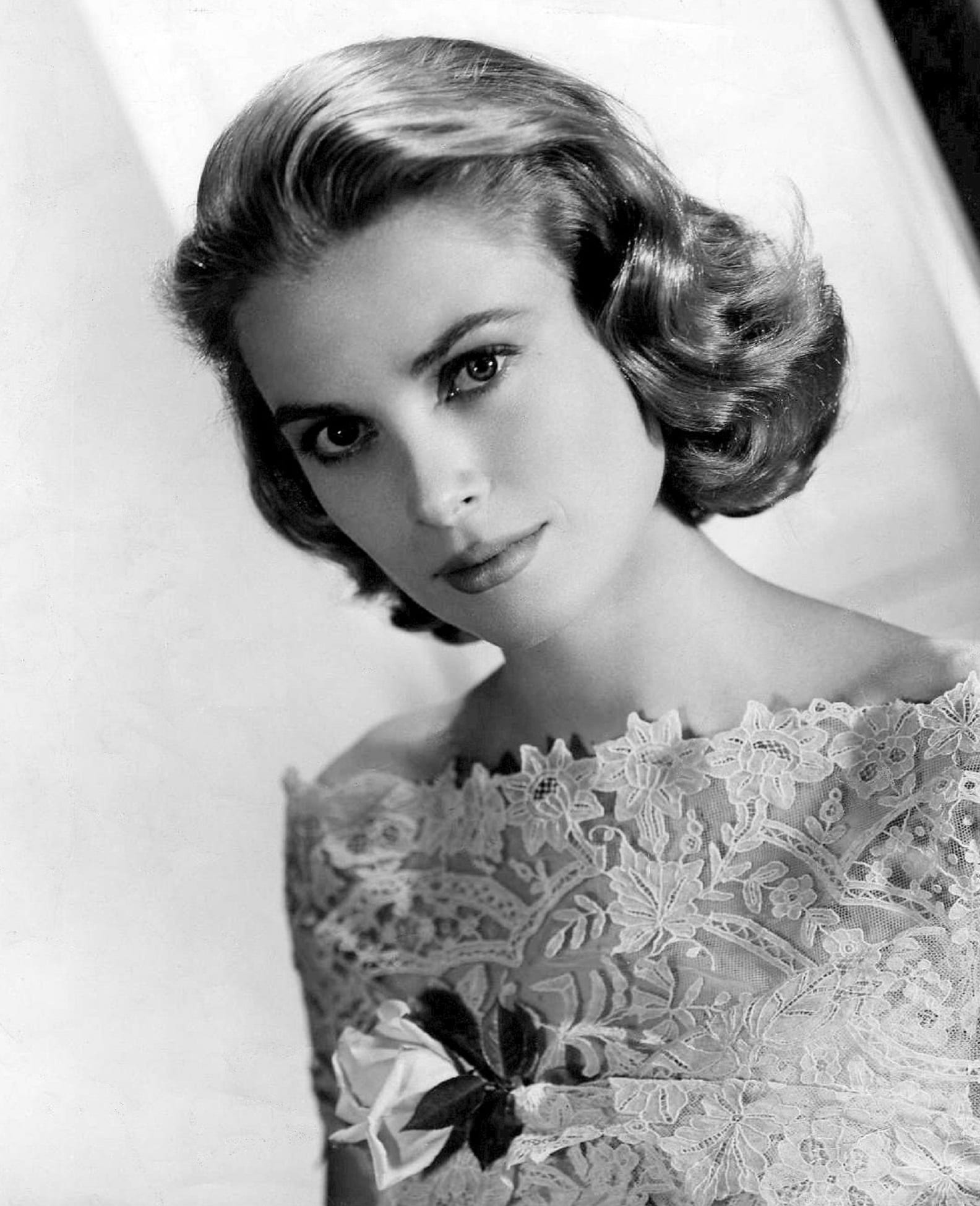 grayscale photo of woman with floral top grace kelly actress