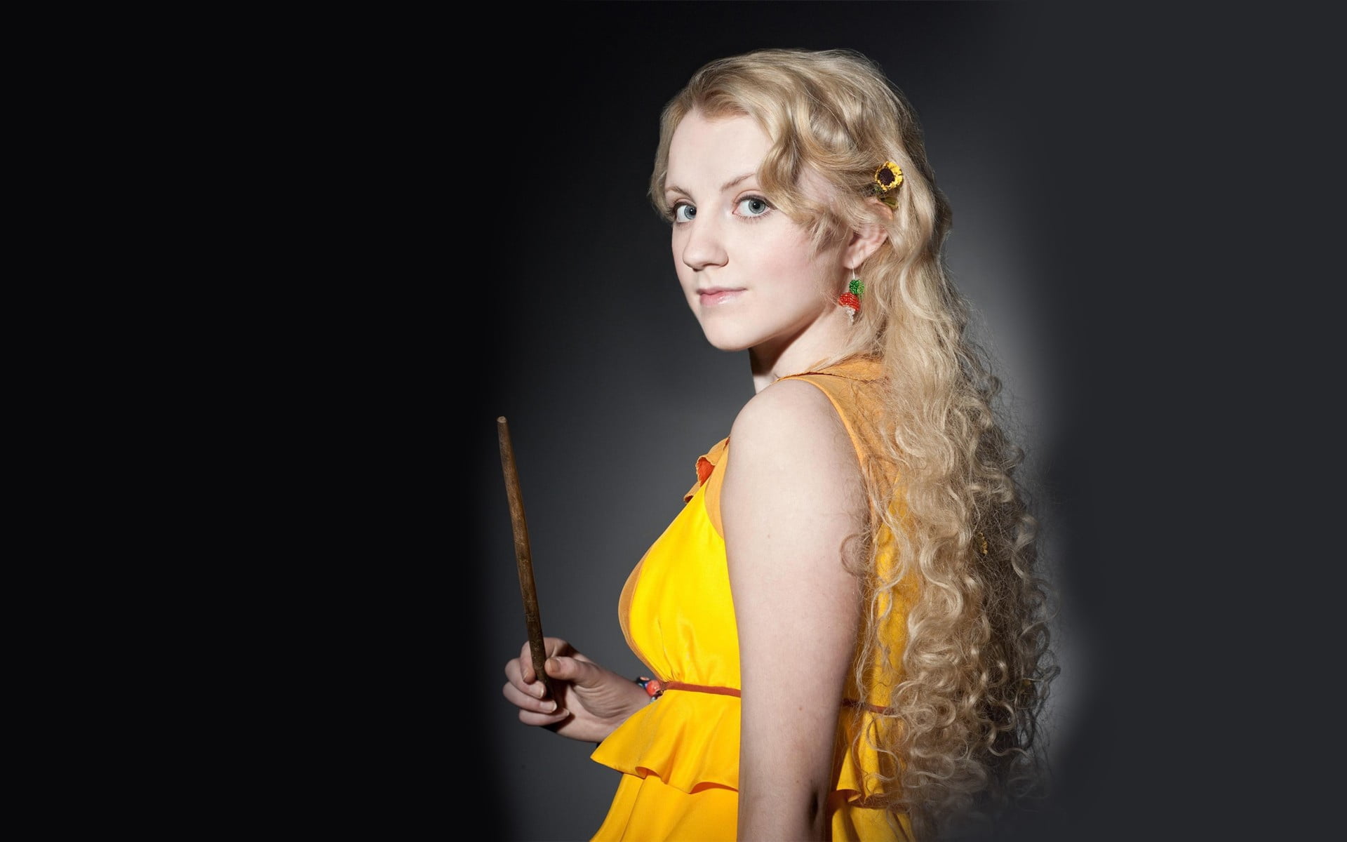 Evanna Lynch yellow dress Harry Potter Luna Lovegood looking back
