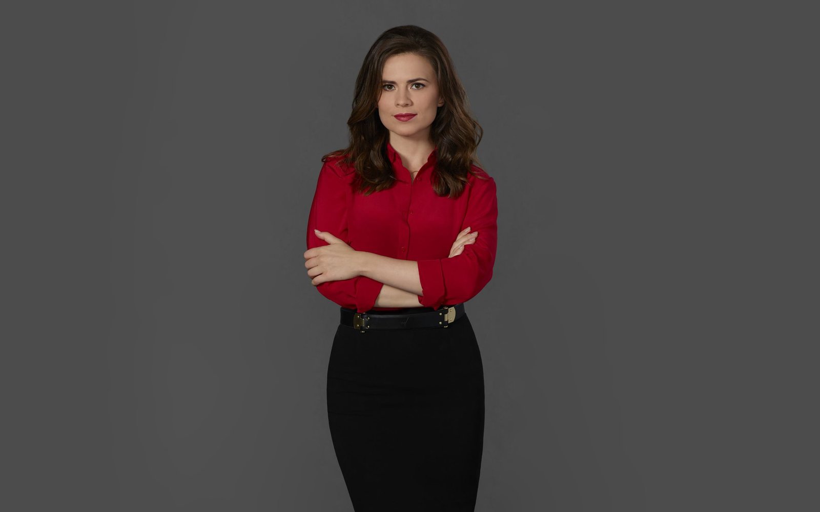 Hayley Atwell brunette actress skirt gray background arms crossed 2k