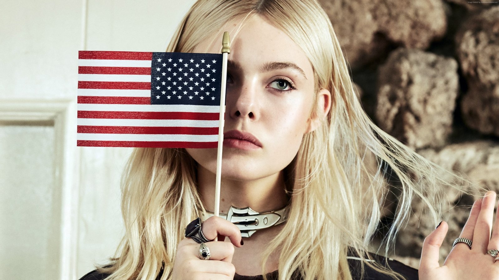 person holding mini U S flag celebrity actress Elle Fanning 2k