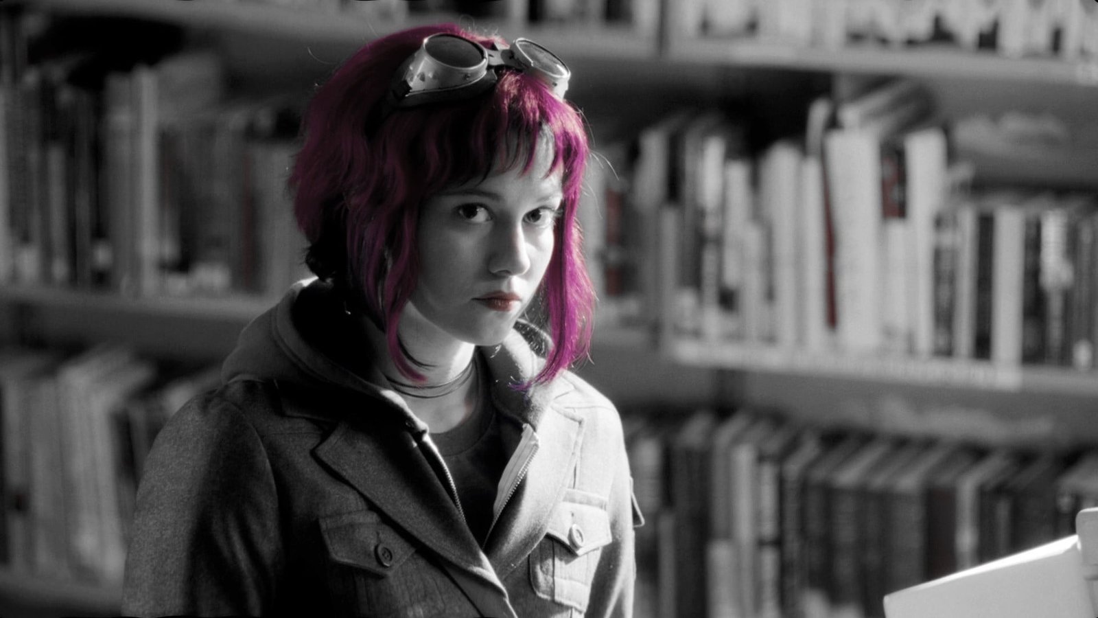 selective color photo of woman with pink hair coloring
