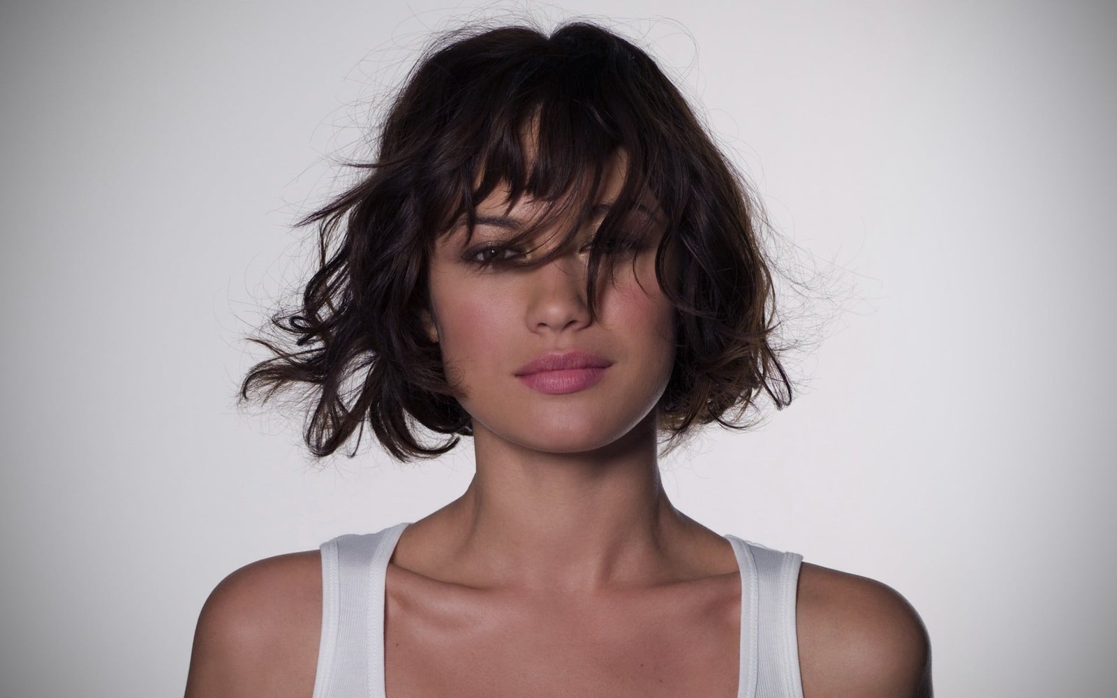 short haired woman wearing white tank top Olga Kurylenko women