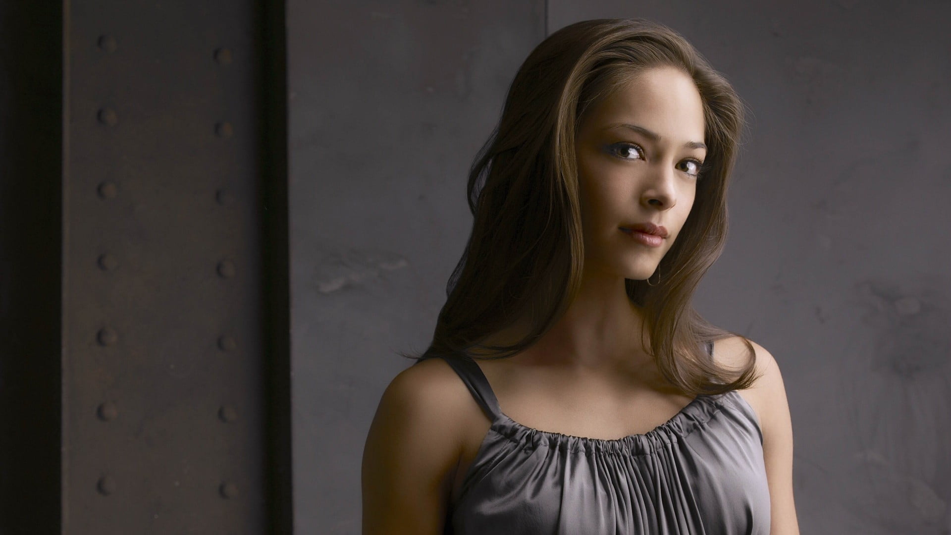 women's black spaghetti strap top Kristin Kreuk actress brunette