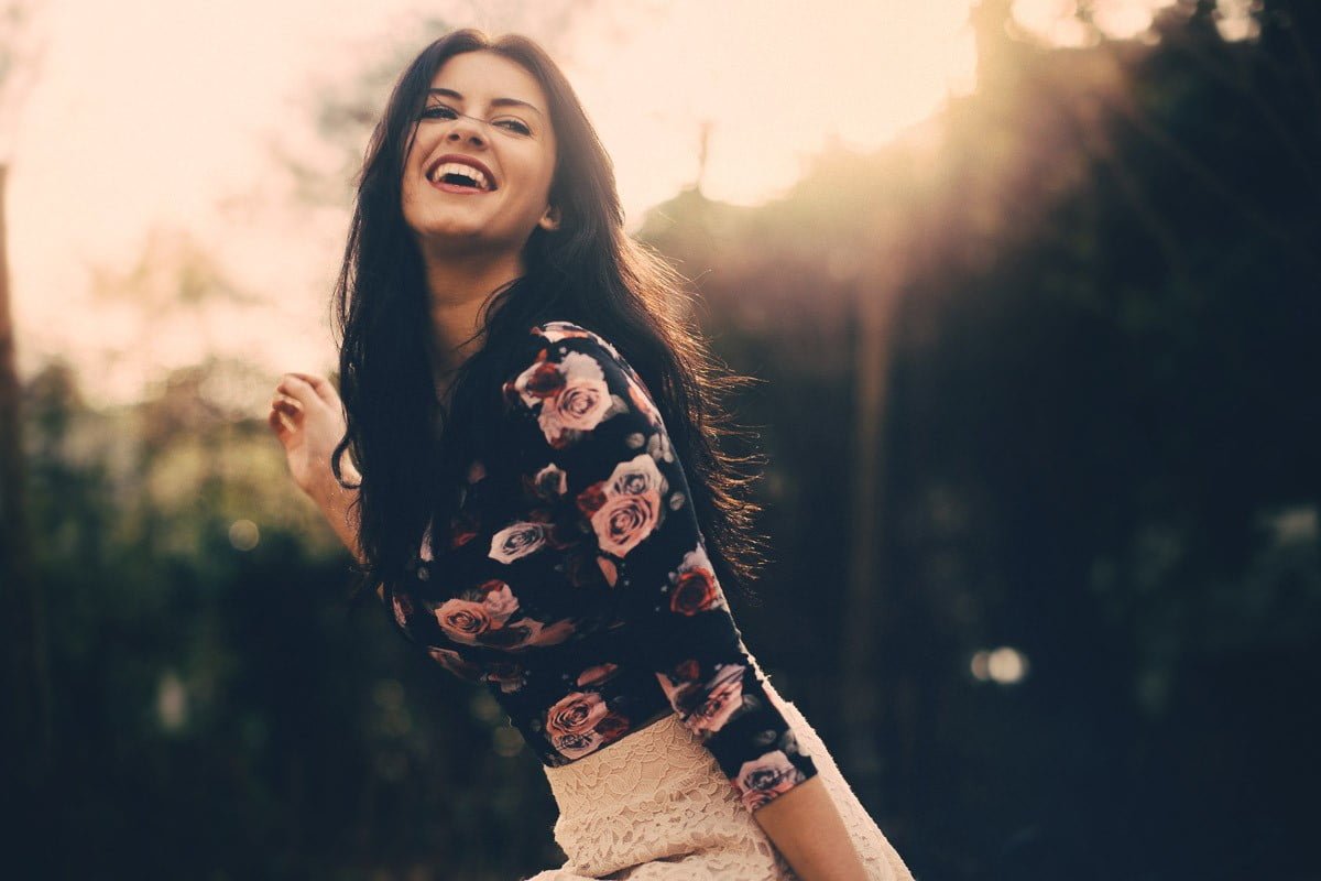 women's black floral top woman wearing and pink shirt