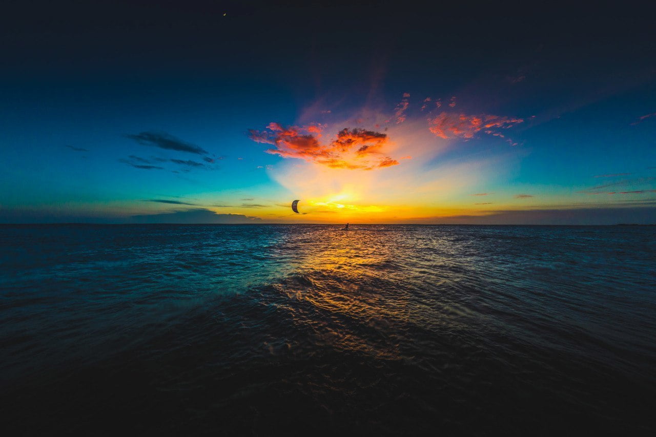 silhouette of kite surfing sea sky kitesurfing water scenics nature