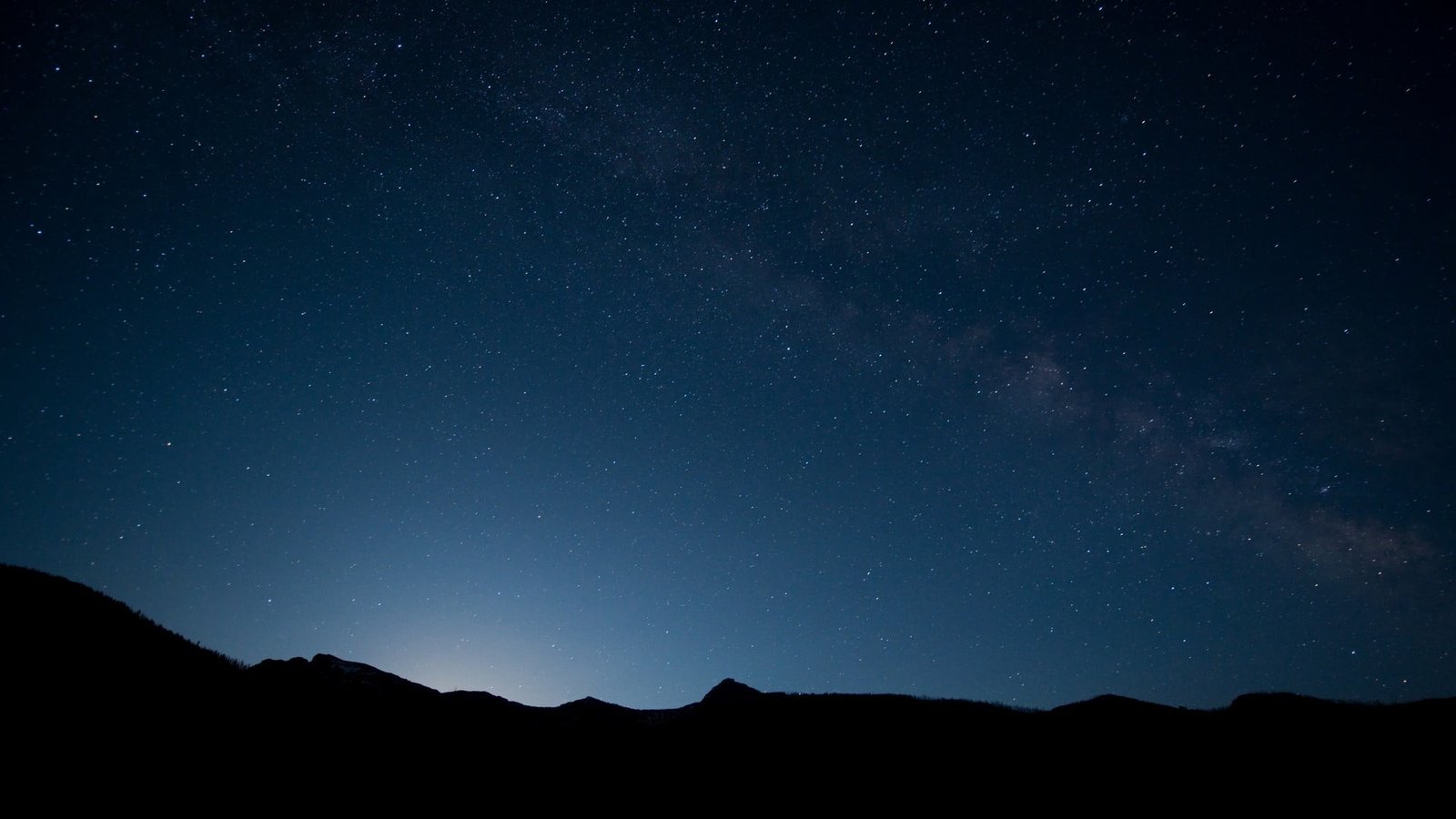landscape at night silhouette photo of mountain with sunrise view 2k