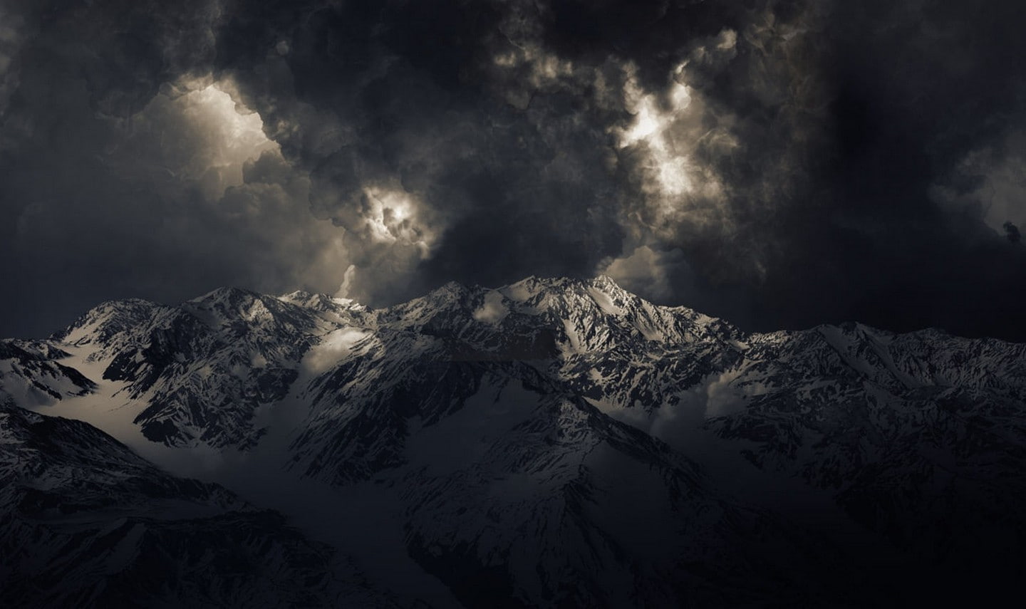 landscape nature mountains storm dark snowy peak sunlight summit clouds