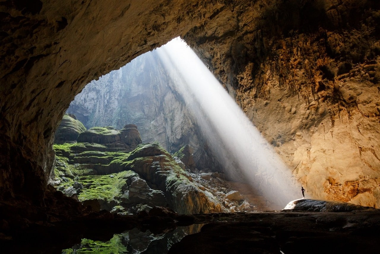 cave Hang Son Doong sun rays nature rock grass landscape