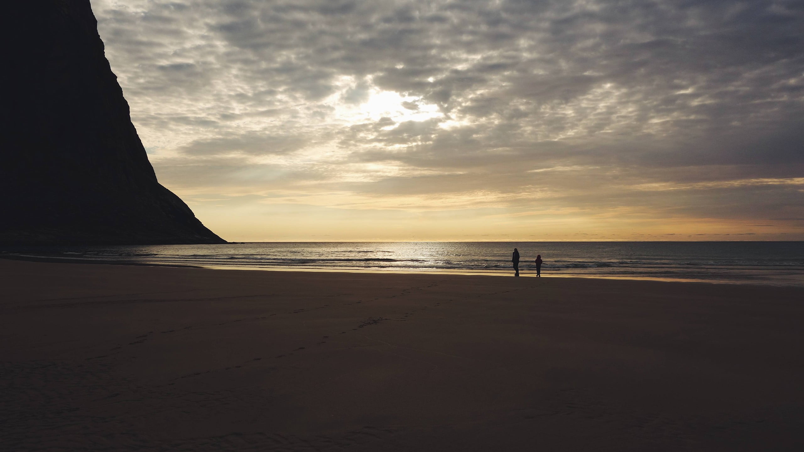 brown wooden framed glass top table sea beach water sky land 2k