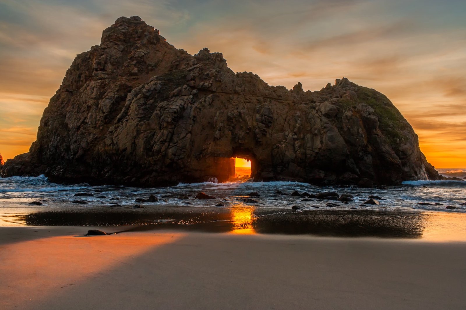 brown rock formation nature landscape sunset beach sea sand 2k
