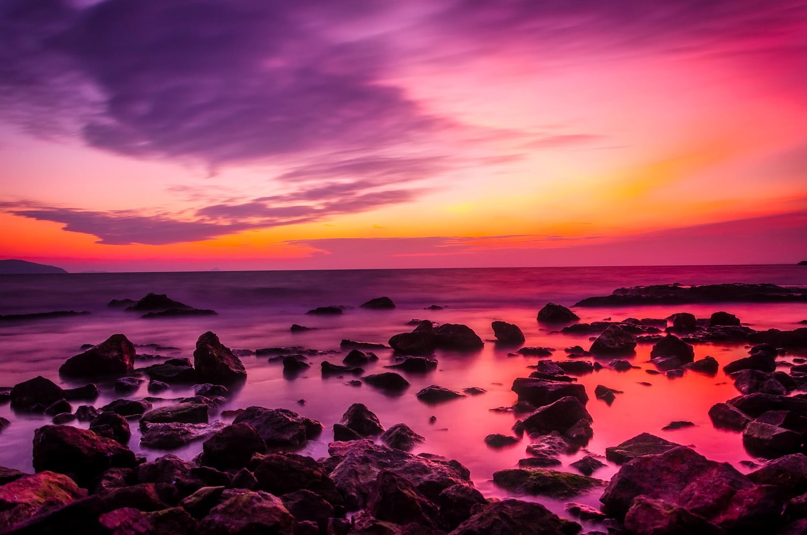 brown stones on ocean turkey sunset dusk sky clouds beautiful 2k