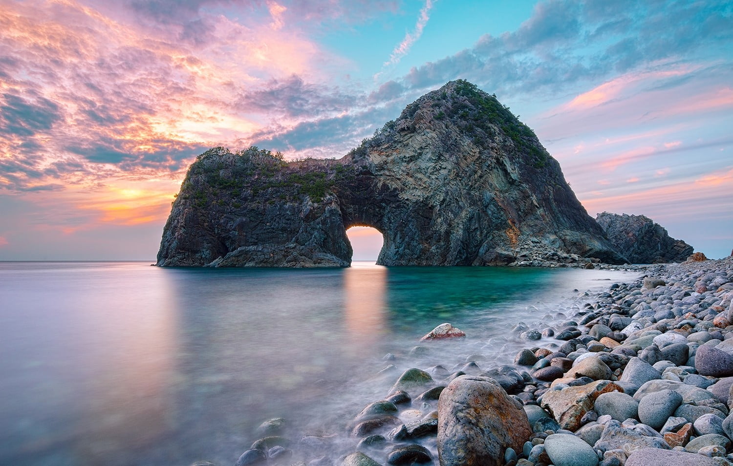 gray rock formation gates sunset beach stones sea nature 2k
