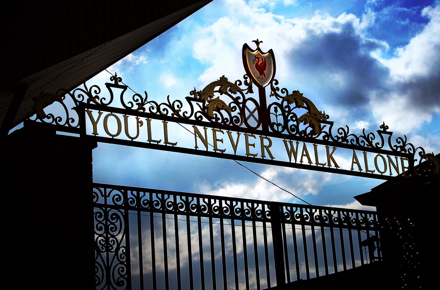 Liverpool FC gates text cloud sky western script architecture