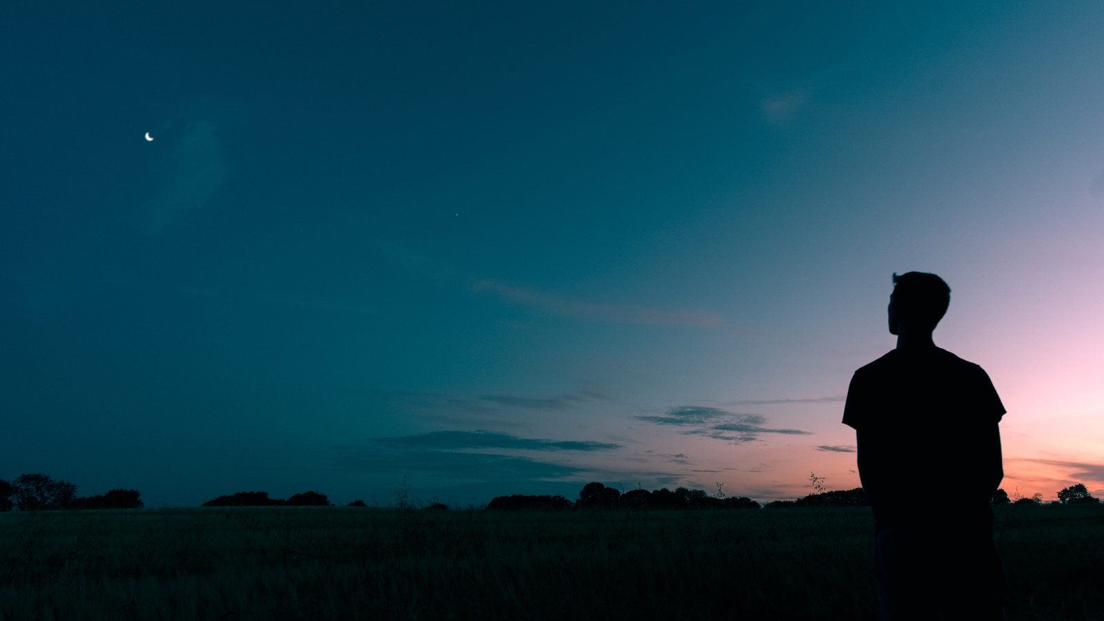 silhouette of man looking star during sunset photography standing and starring moon 2k 4k