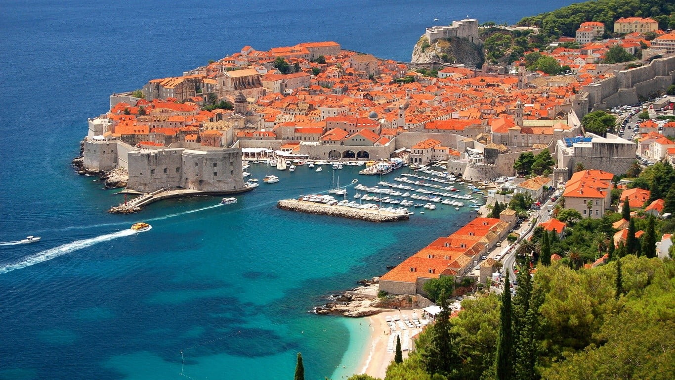 white and brown concrete buildings Dubrovnik sea cityscape