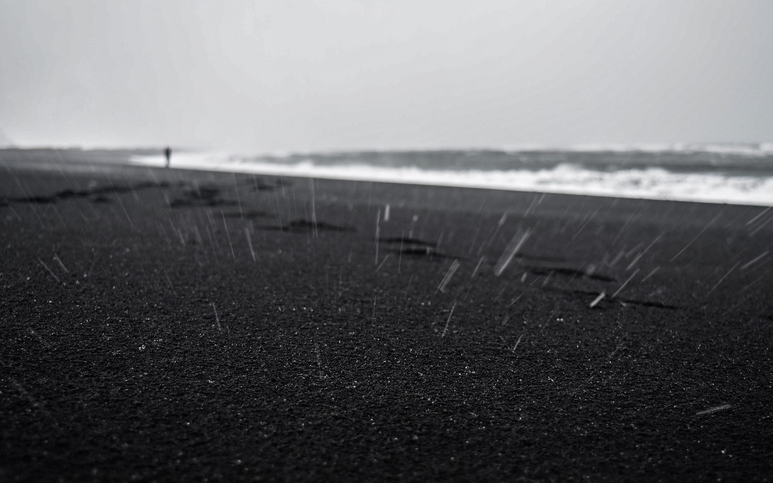 black sand beach landscape rain water sky tranquility nature 2k