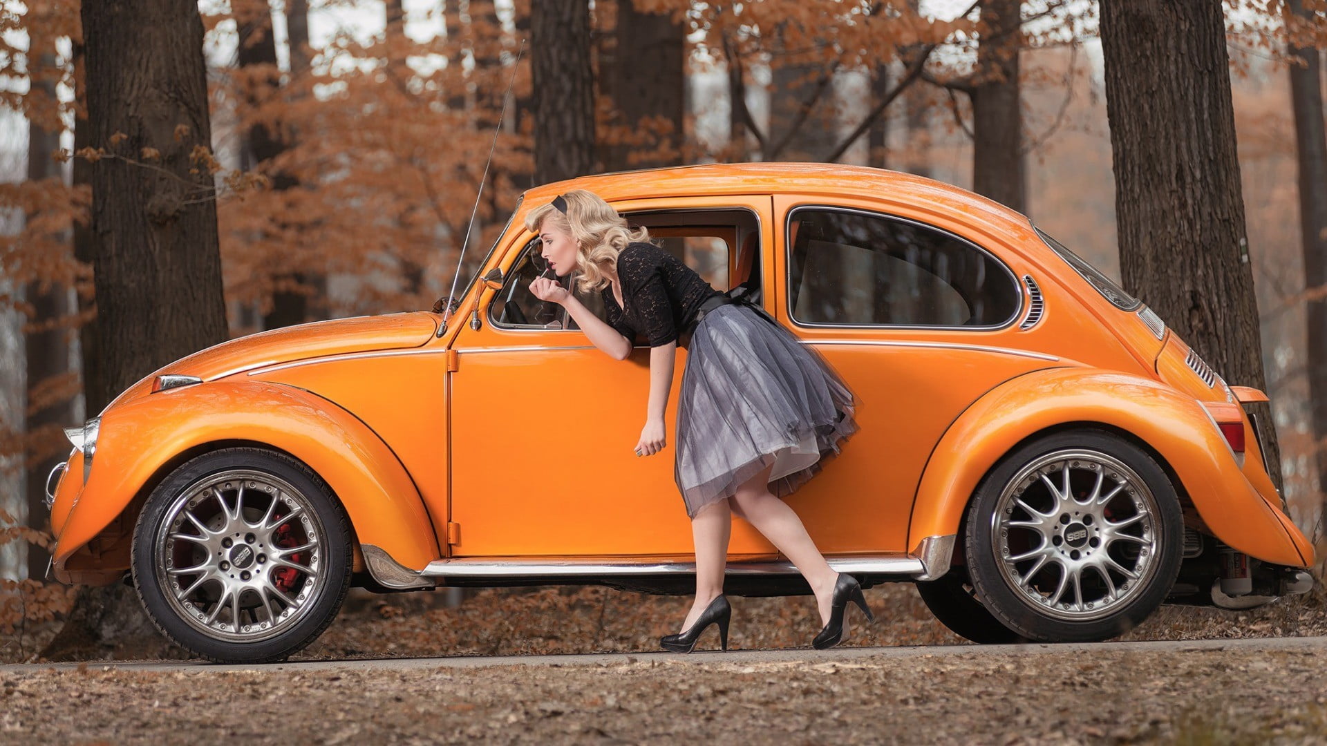orange Volkswagen Beetle women model blonde long hair outdoors 2k