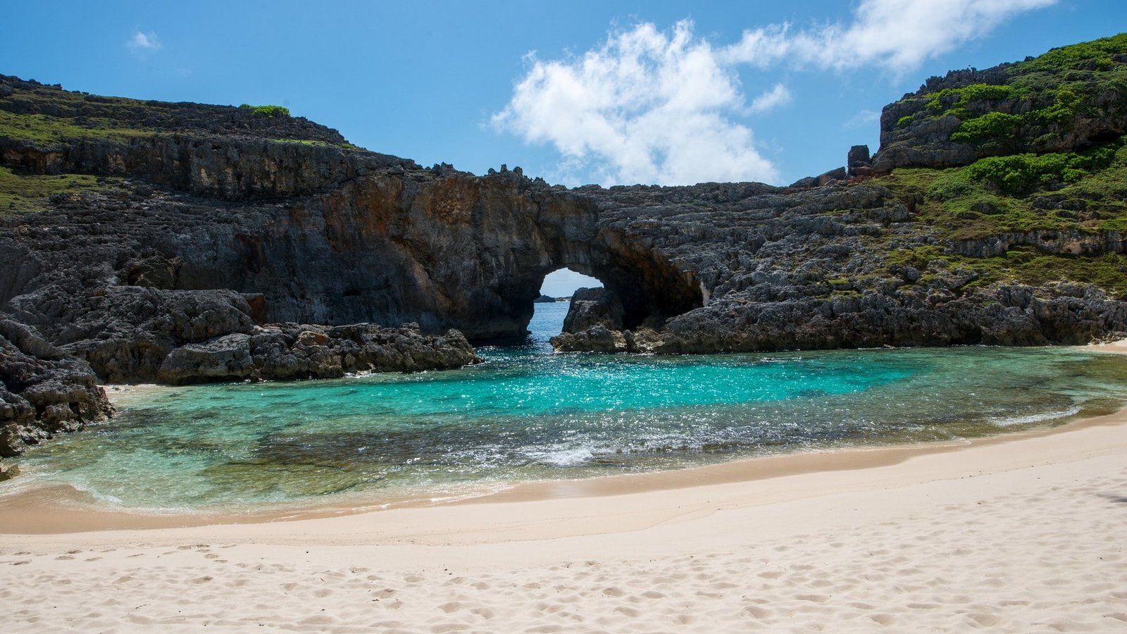landscape sand beach water sea sky rock beauty in nature 2k
