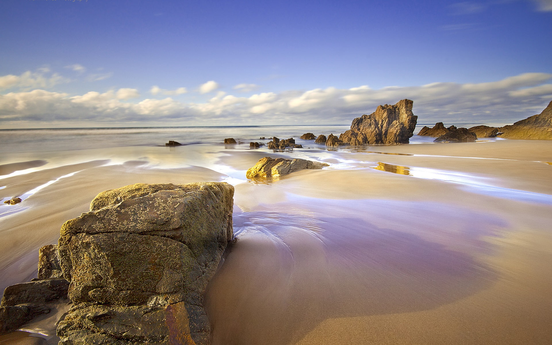 Spain Asturias beach sea rocks brown rock formation 2k