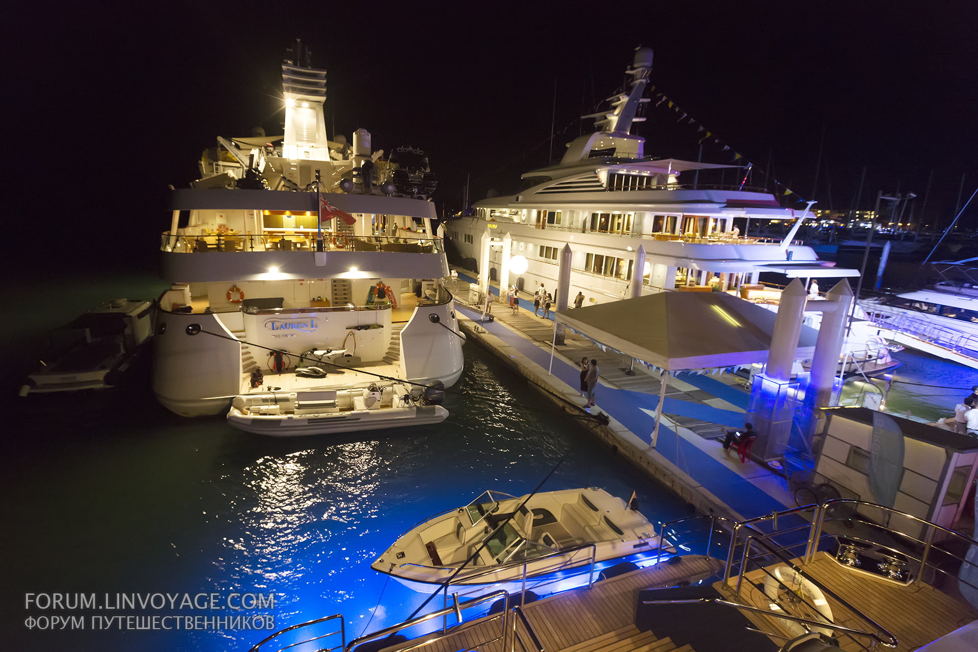 two white cruise ships during nighttime superyachts sea ocean ship 2k