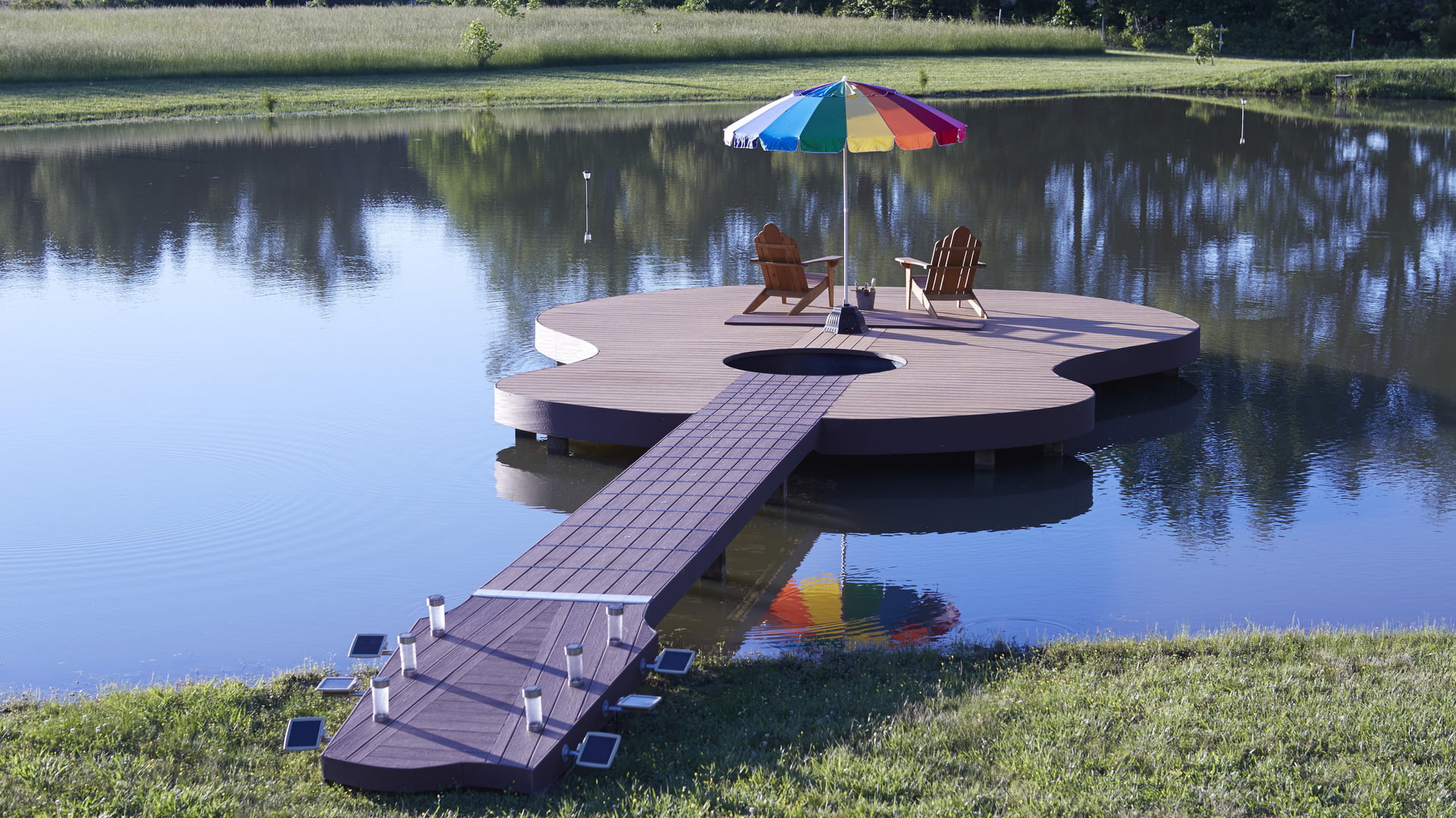 guitar shaped brown and beige dock with two aderondak patio umbrella 2k