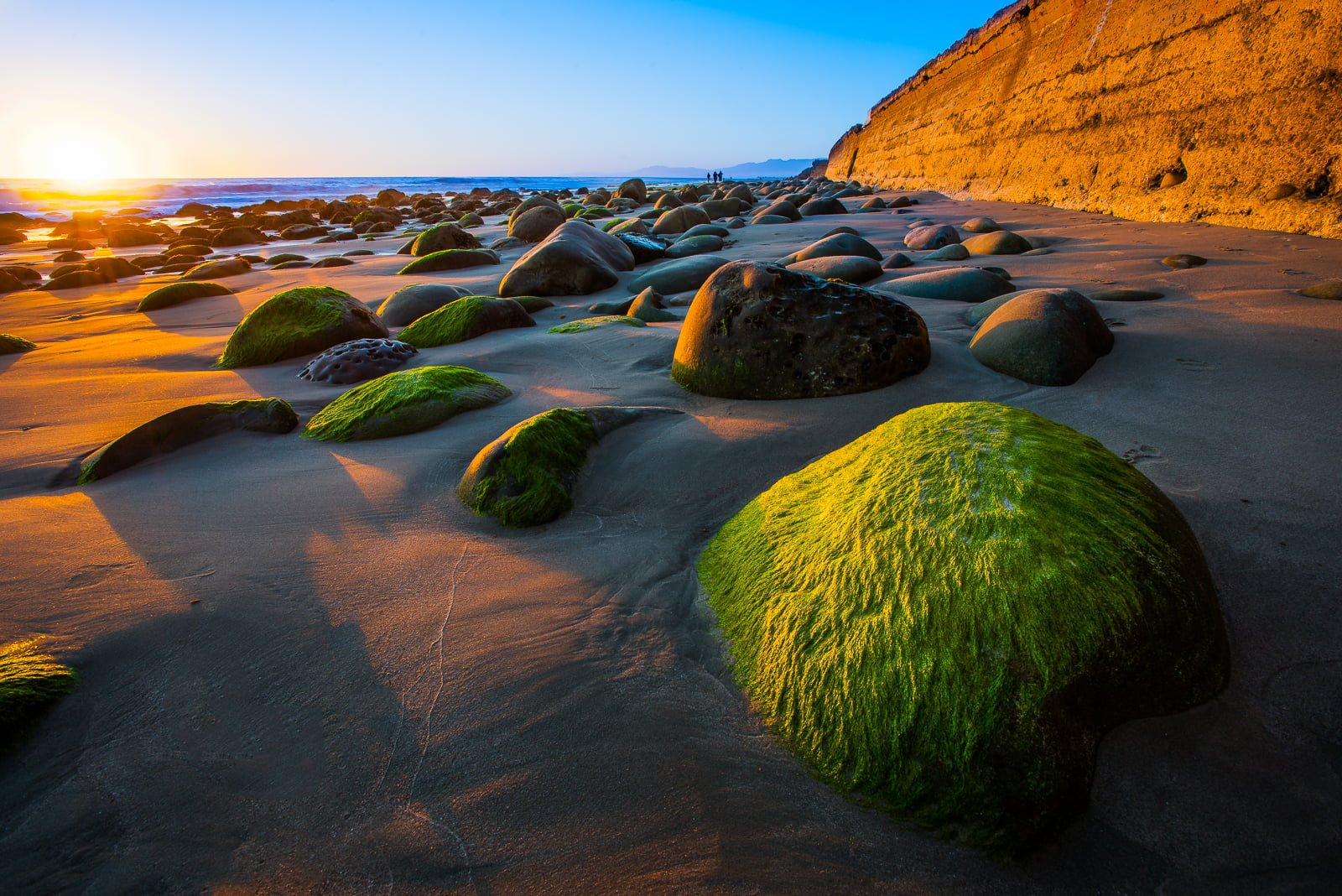 concrete rocks on soil during sunset Rocky CA ocean surf 2k