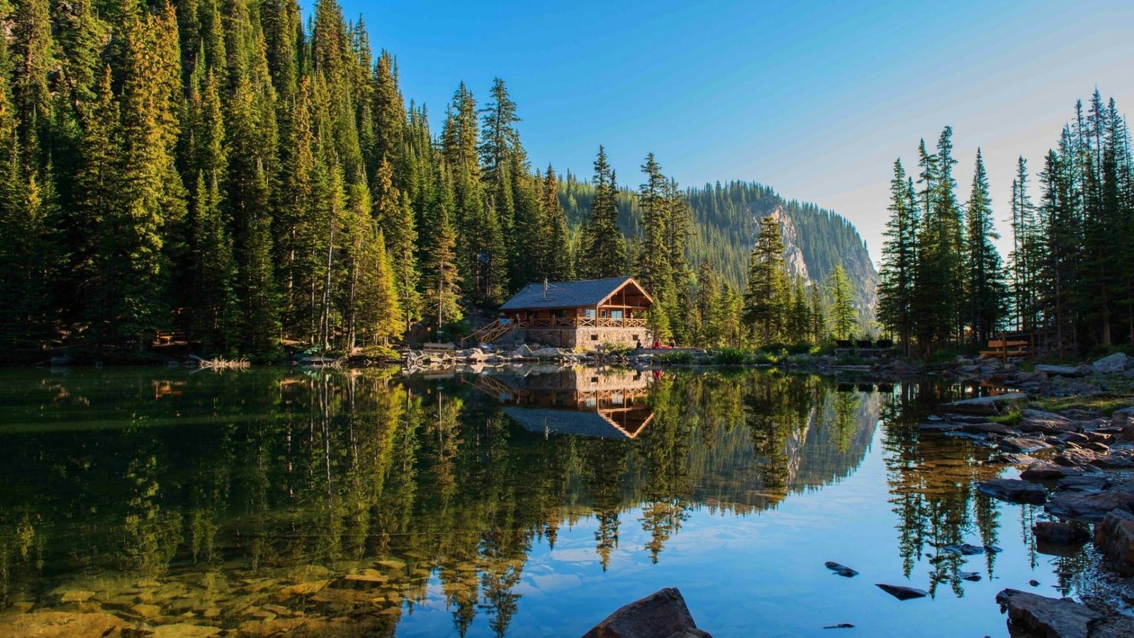 reflection water nature lake wilderness log cabin tree 2k