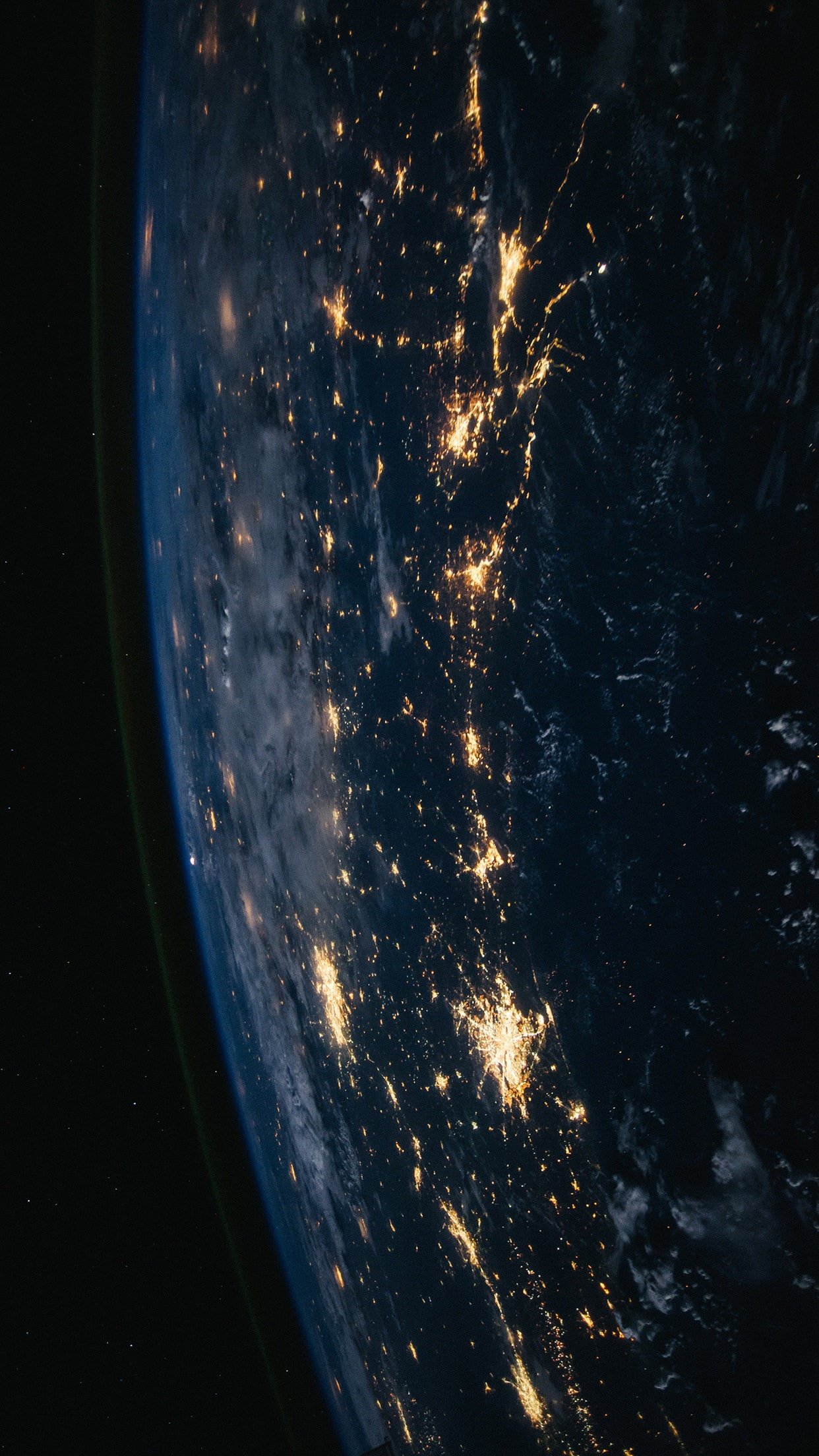 space vertical portrait display ISS night no people nature