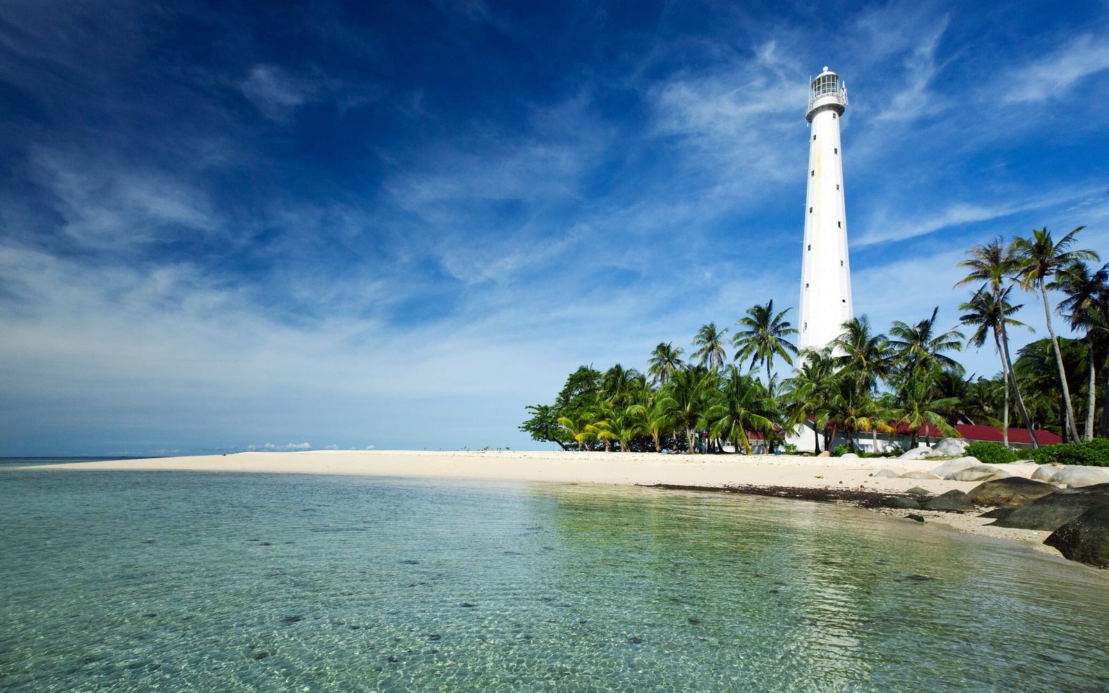 white lighthouse palm trees coast Indonesia Belitung Island 2k
