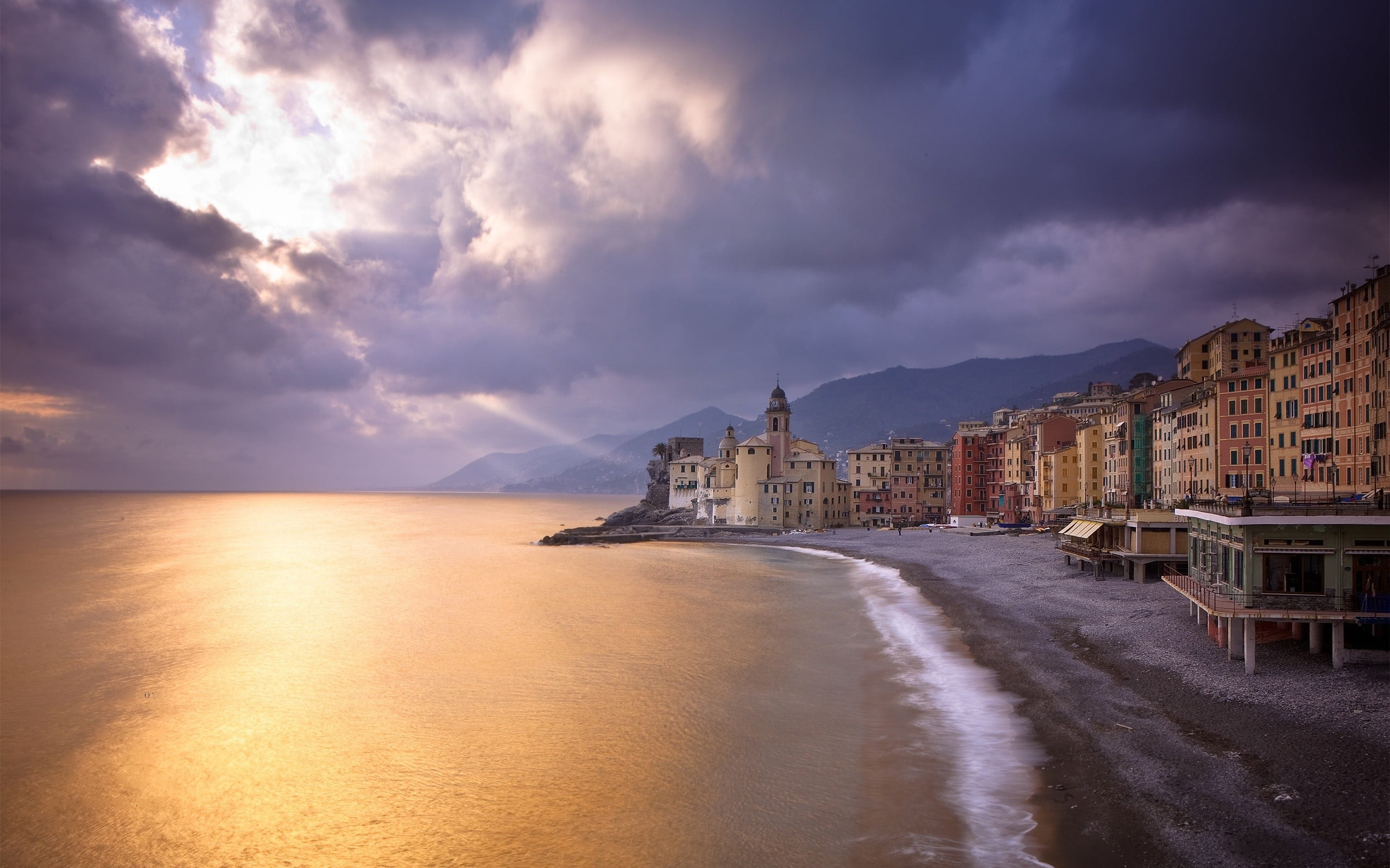 brown concrete building architecture coastline camogli Italy 2k
