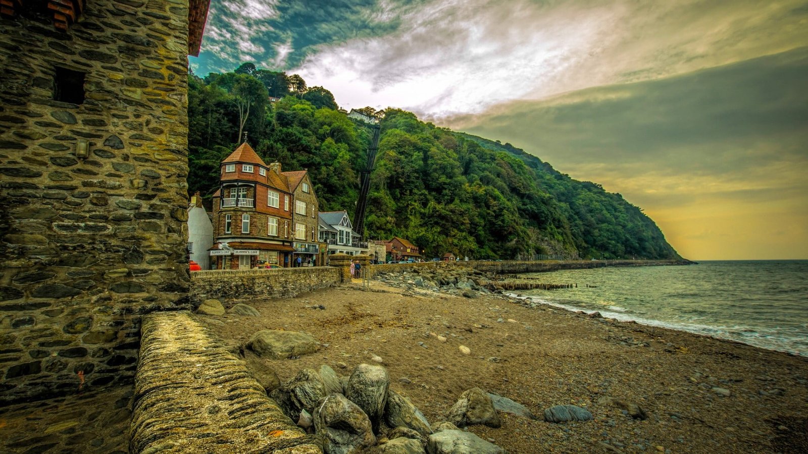brown concrete house nature landscape England UK coast sea 2k