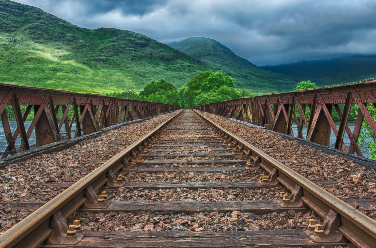 Brown Train Rail Way bridge clouds cloudy dark field 2k
