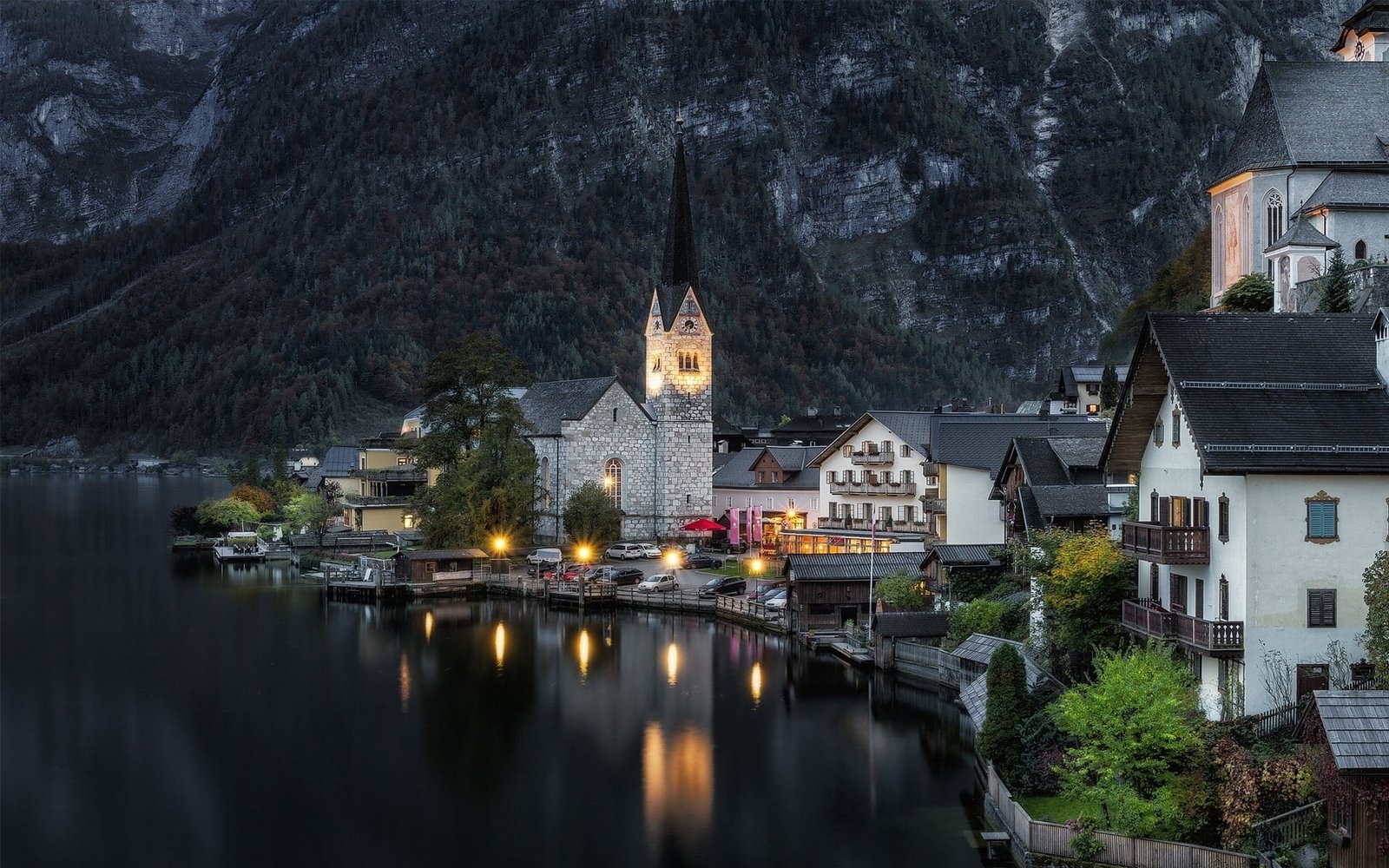 black and white concrete building Hallstatt Austria sunset 2k