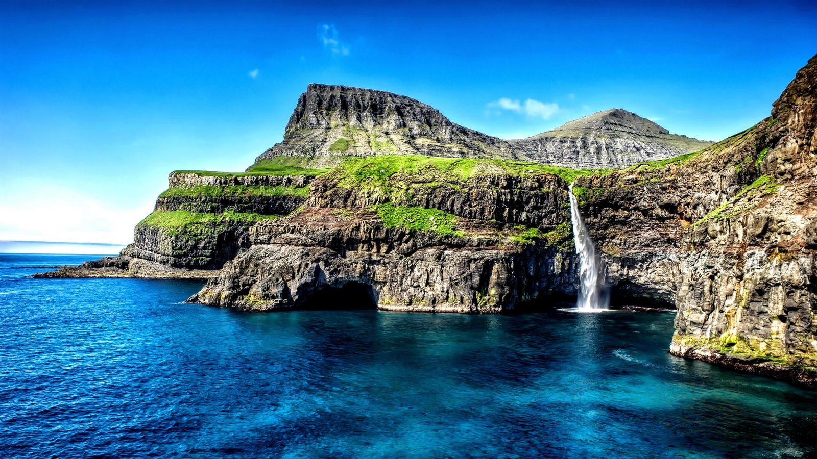 waterfall blue sea ocean sky denmark rock mount scenery 2k