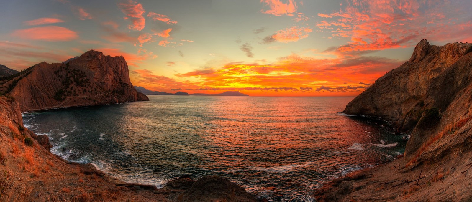 shoreline landscape sea sunset rocks clouds sky coast 2k
