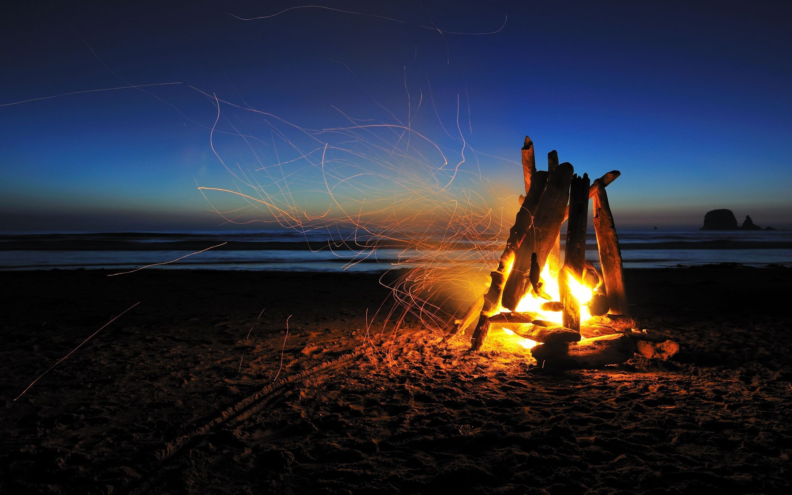 fire long exposure beach sky 2k