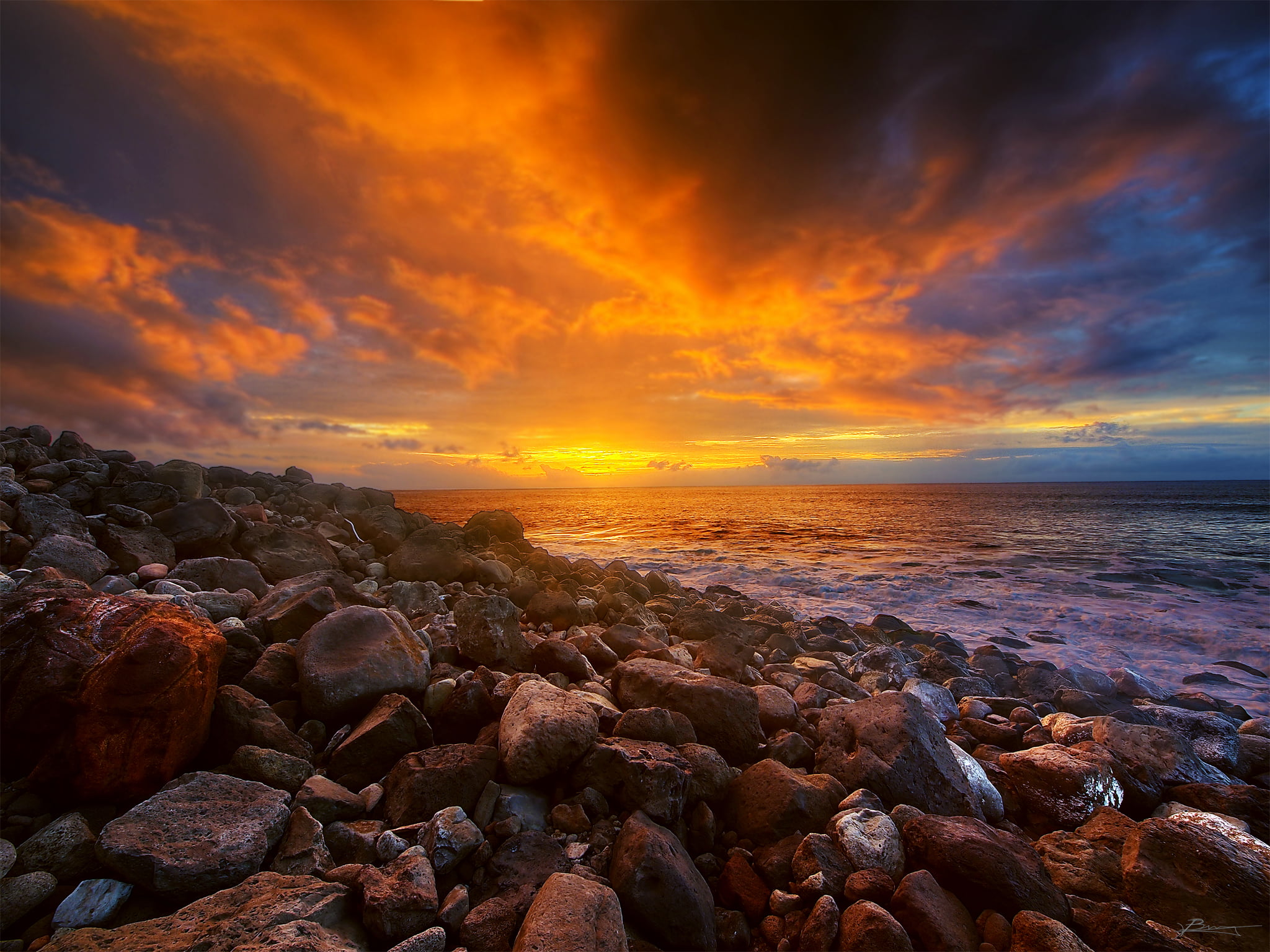 photograph of stones and beach end the day kauai hawaii 2k