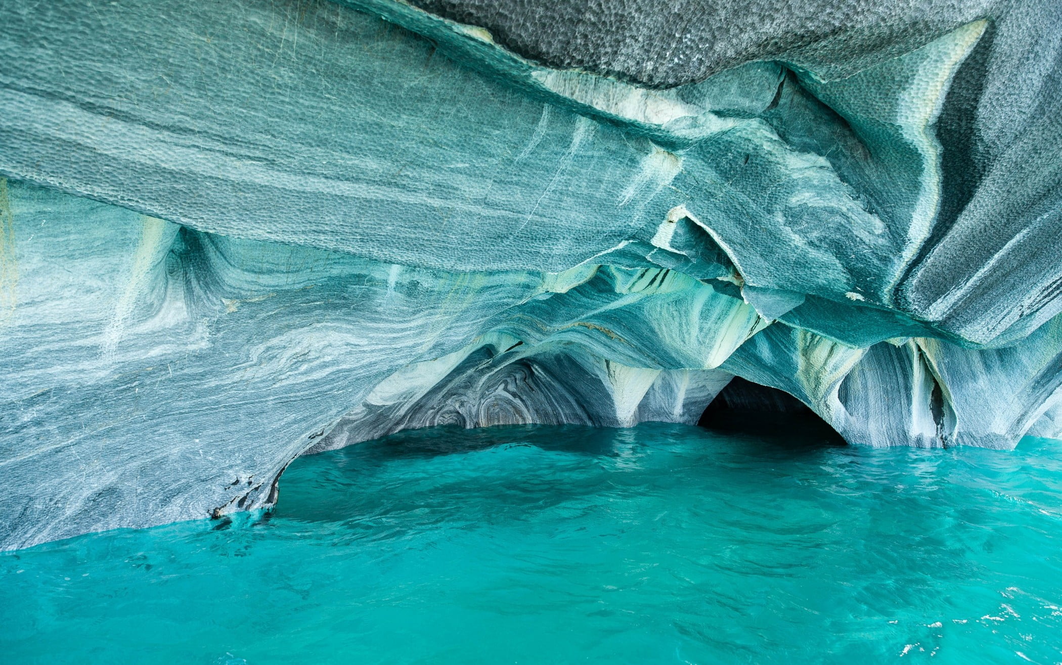 blue and white rock cave landscape nature Chile lake erosion 2k